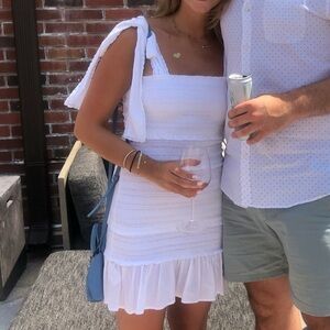 Loveshack Fancy smocked mini dress with tie shoulders